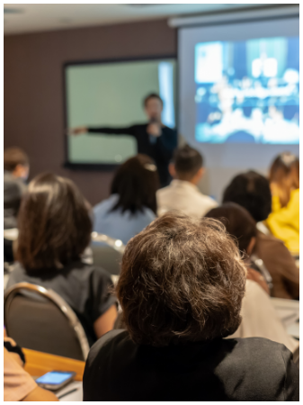 instructor leading class of dentists